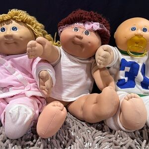 Charming Trio of Plush Dolls with Accessories